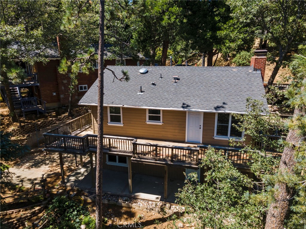 812 Bergschrund Drive Crestline, CA 92325 - Photo 20 of 23 a aerial view of a house with a yard and large trees