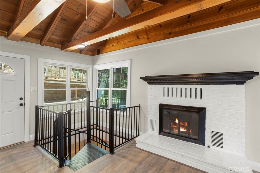 812 Bergschrund Drive Crestline, CA 92325 - Photo 4 of 23 a view of a livingroom with a fireplace