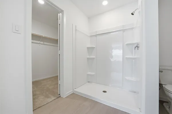 a view of an empty walk in closet