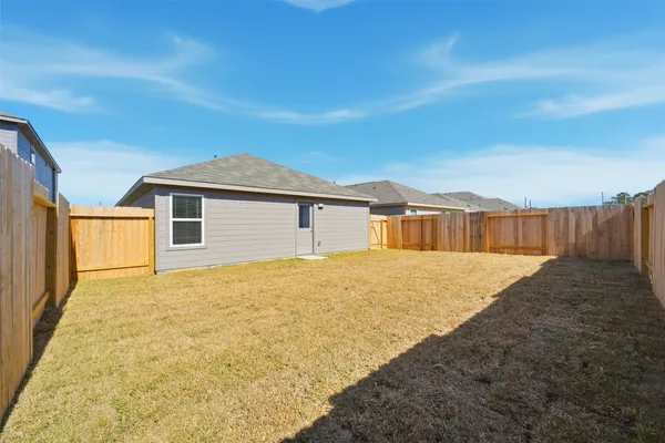 a bathroom with a sink and a yard