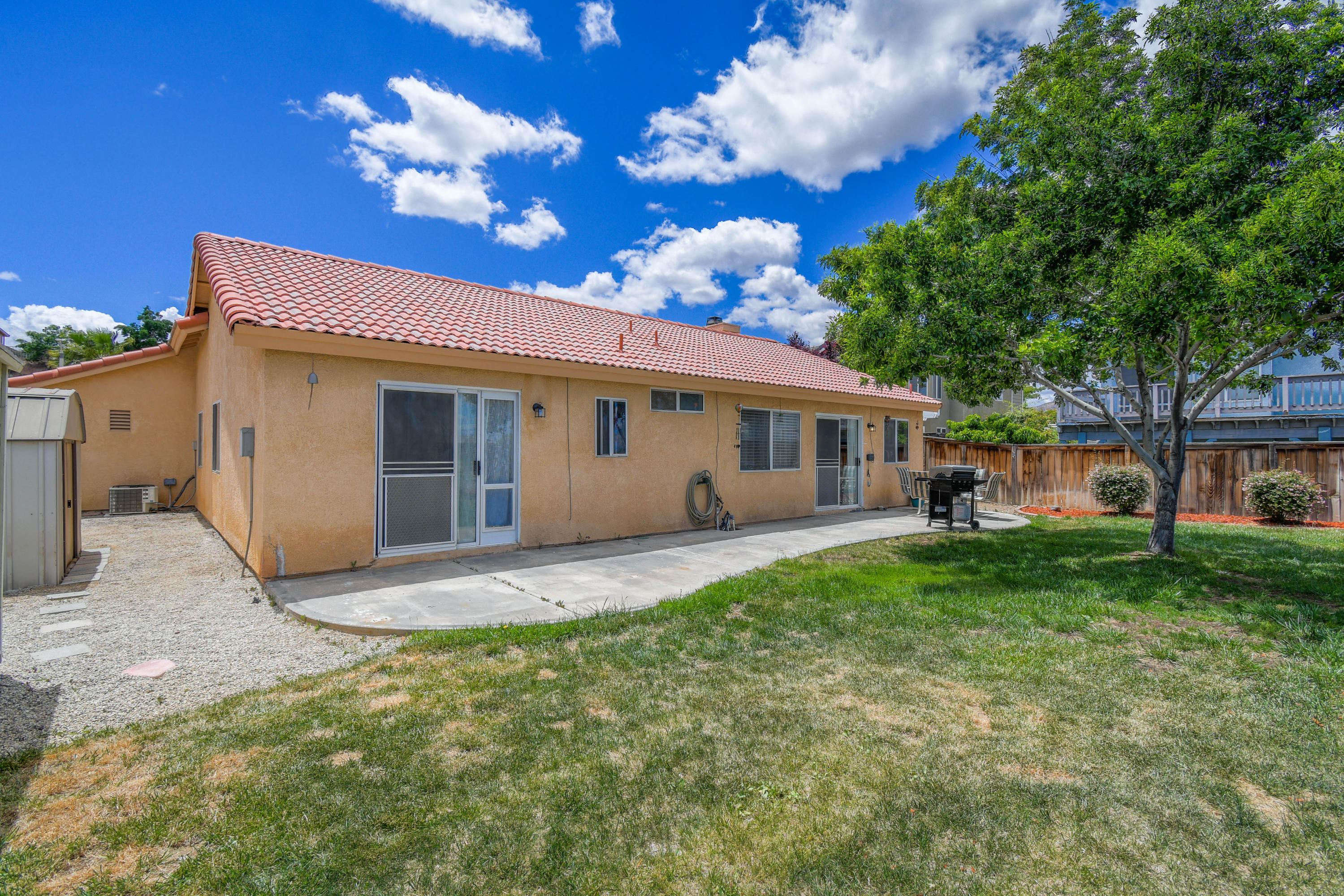 3129 Quarry Road Palmdale, CA 93550 - Photo 17 of 19 a view of a house with a patio