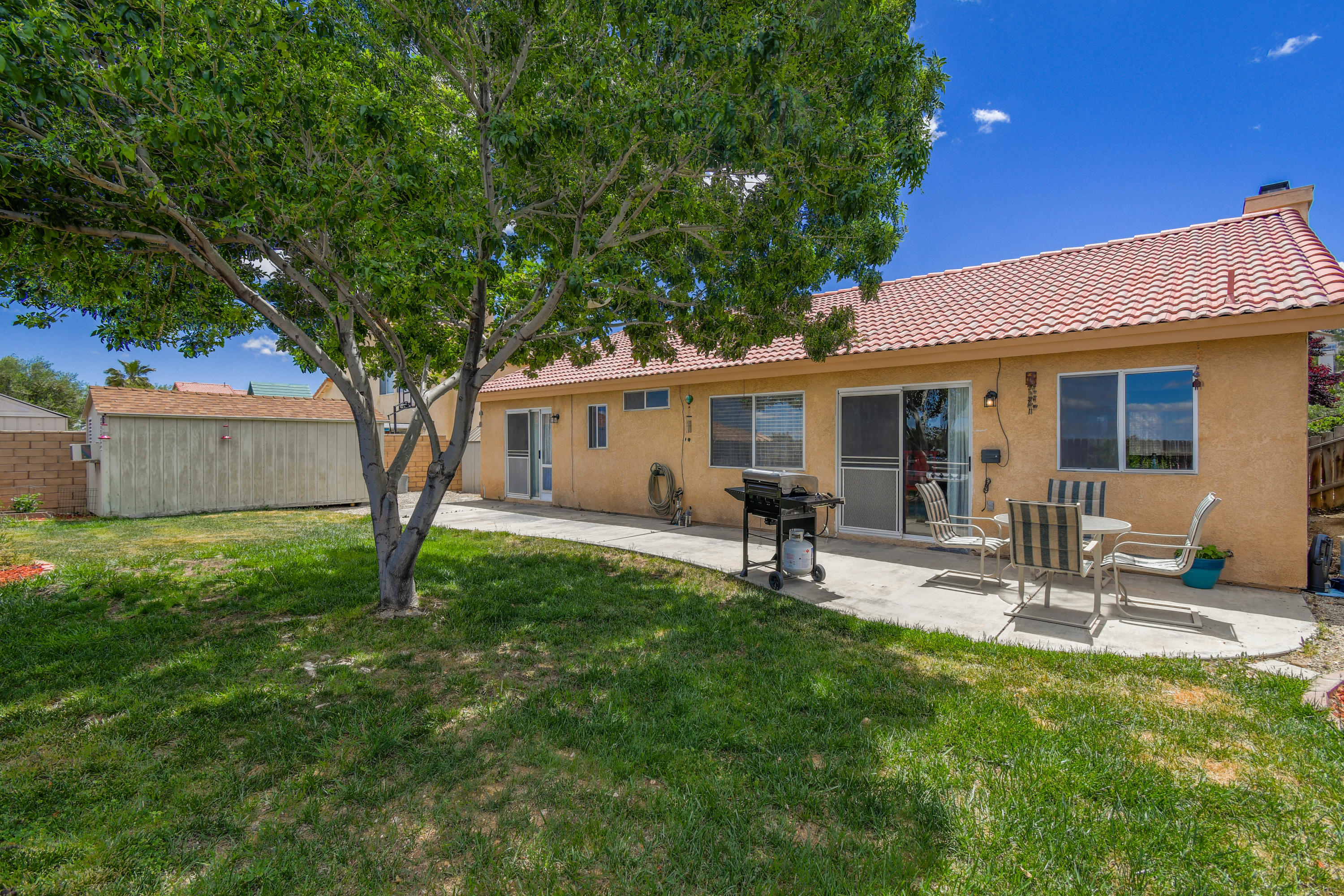 3129 Quarry Road Palmdale, CA 93550 - Photo 18 of 19 a house view with outdoor seating space and garden