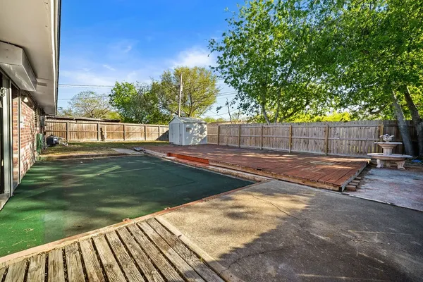 a view of a backyard with a garden