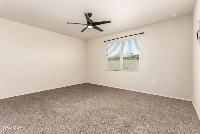 a view of a big room with carpet