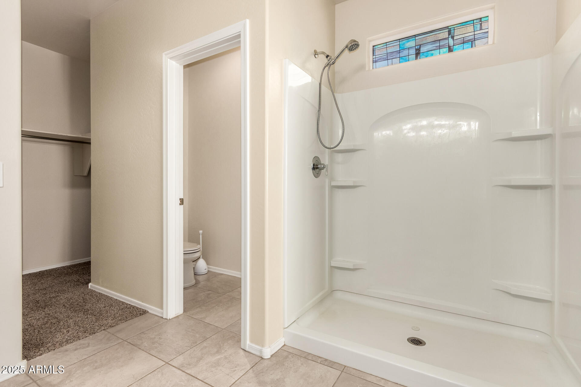9458 Cotton Road Florence, AZ 85132 - Photo 18 of 30 a bathroom with a bath tub