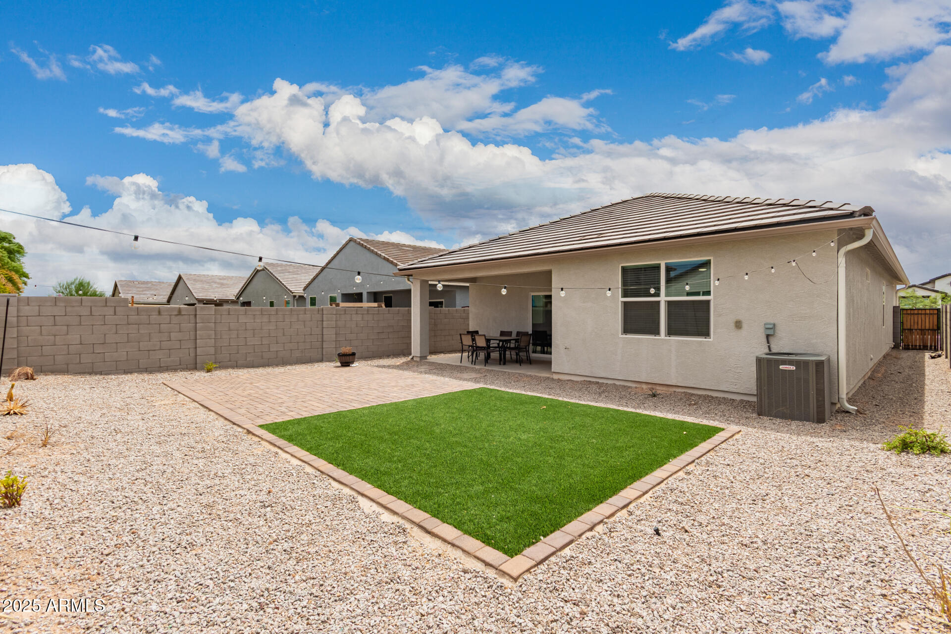 9458 Cotton Road Florence, AZ 85132 - Photo 29 of 30 a view of a backyard of the house