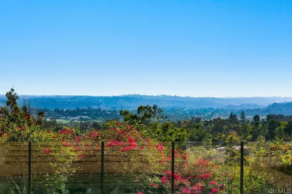 a view of a lake with mountains in the background