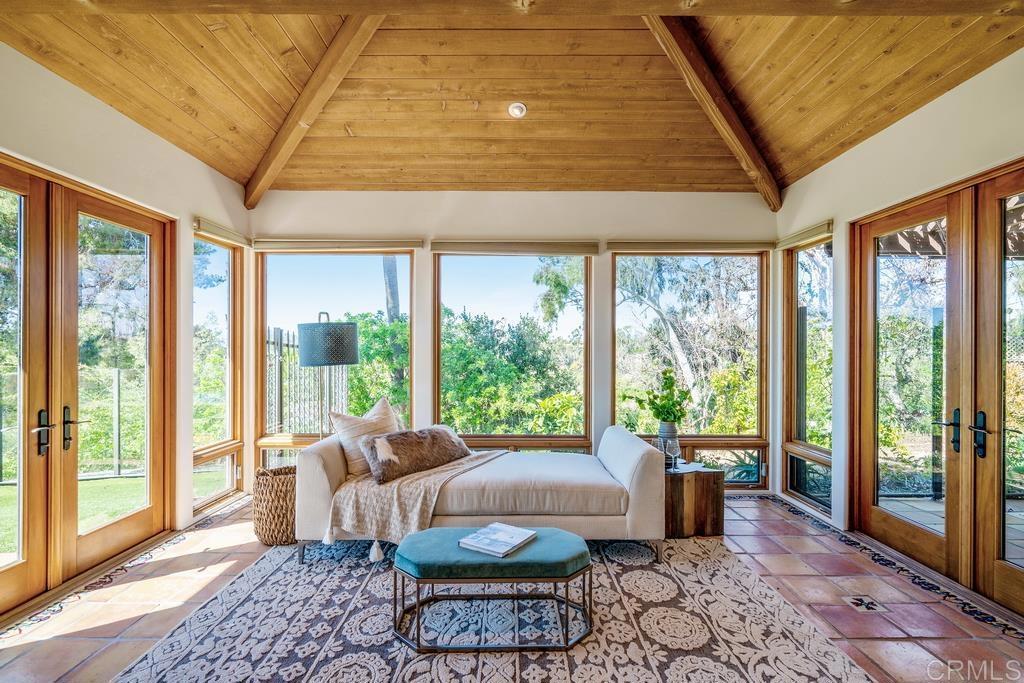 17140 El Mirador Rancho Santa Fe, CA 92067 - Photo 15 of 18 a living room with furniture and a large window