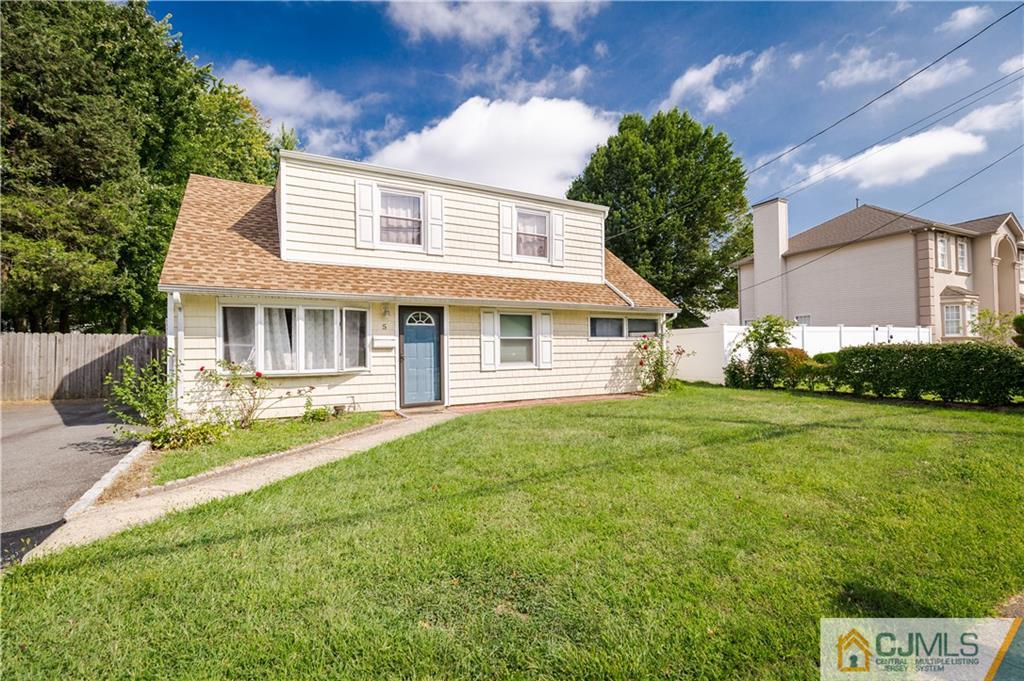 5 Mercury Road Edison, NJ 08817 - Photo 1 of 29 a front view of a house with a yard
