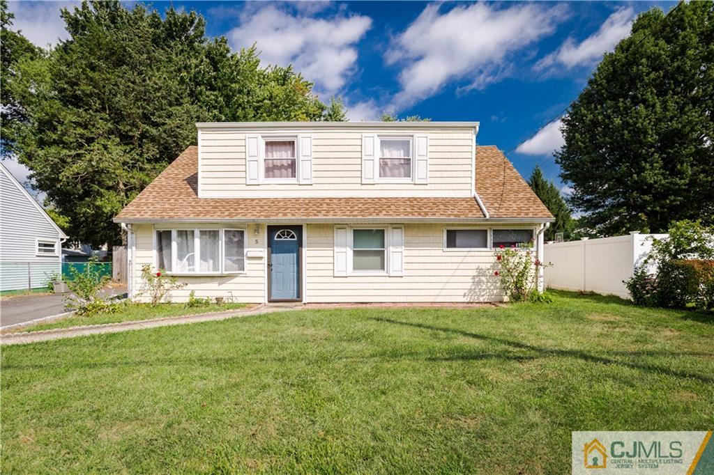 5 Mercury Road Edison, NJ 08817 - Photo 2 of 29 a front view of a house with a yard