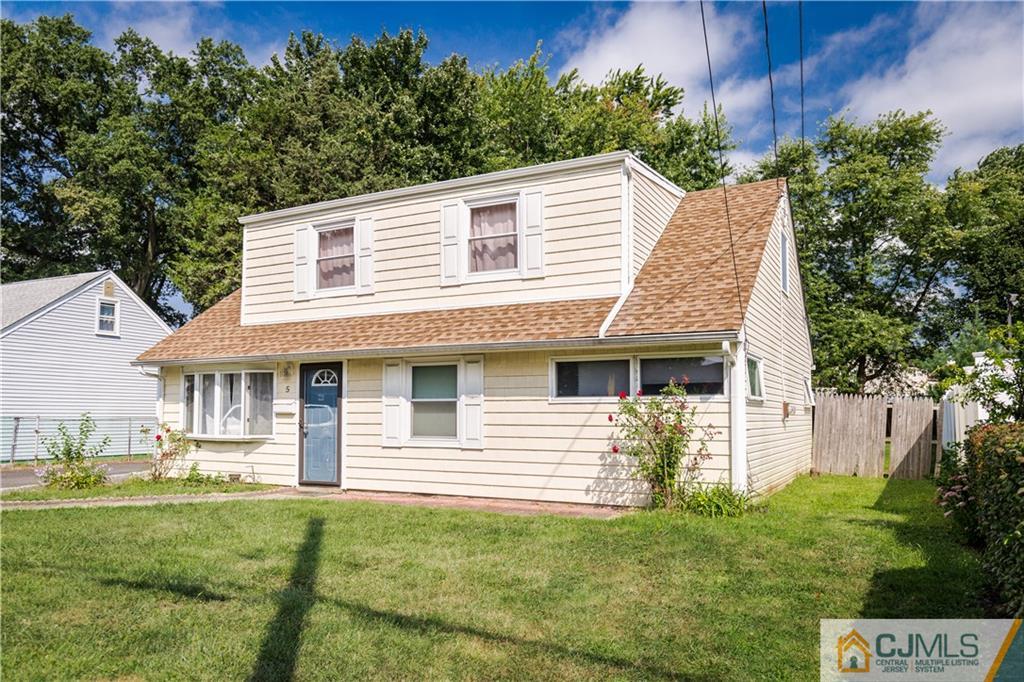 5 Mercury Road Edison, NJ 08817 - Photo 3 of 29 a front view of a house with a yard
