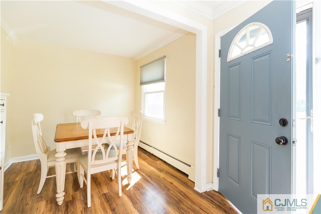 5 Mercury Road Edison, NJ 08817 - Photo 5 of 29 a view of a dining room with furniture and wooden floor