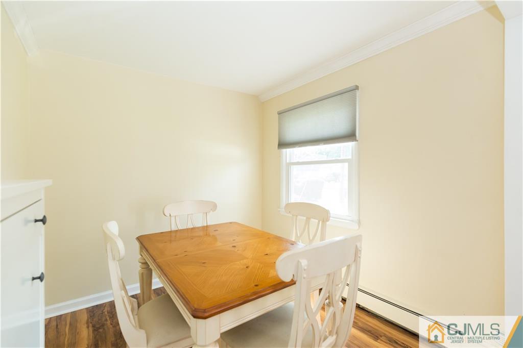 5 Mercury Road Edison, NJ 08817 - Photo 9 of 29 a bedroom with a bed and a table in it