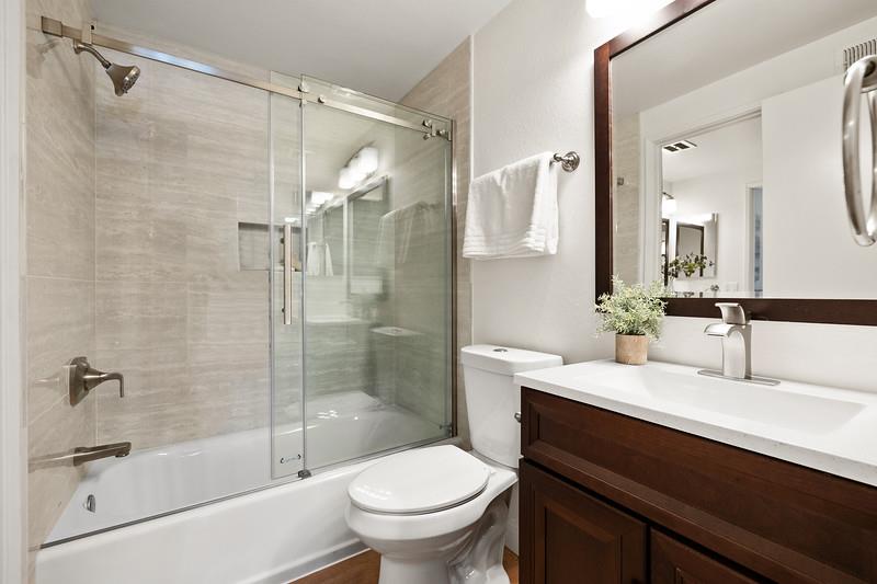 765 Comet Drive Foster City, CA 94404 - Photo 25 of 33 a bathroom with a sink and a mirror