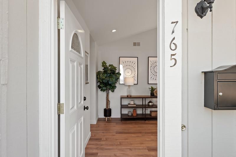 765 Comet Drive Foster City, CA 94404 - Photo 5 of 33 a view of an entryway with wooden floor
