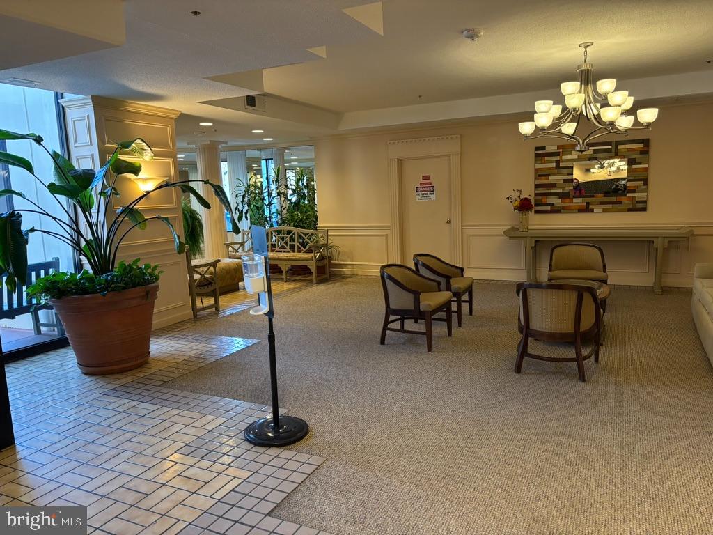 15115 Interlachen Drive, Unit 31020 Silver Spring, MD 20906 - Photo 2 of 48 a dining room with furniture and chandelier