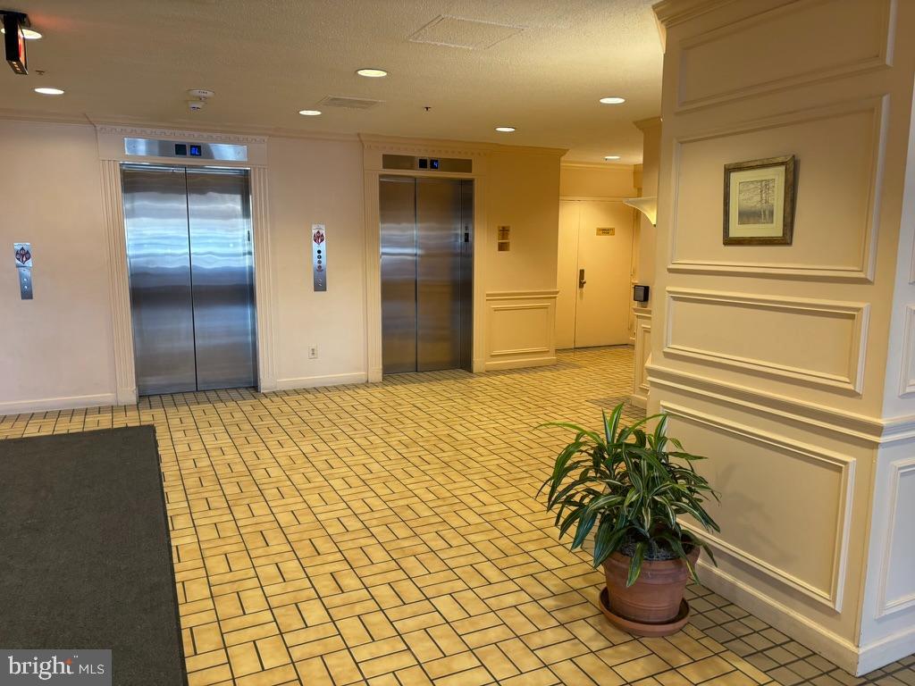 15115 Interlachen Drive, Unit 31020 Silver Spring, MD 20906 - Photo 4 of 48 a view of a entryway of the house