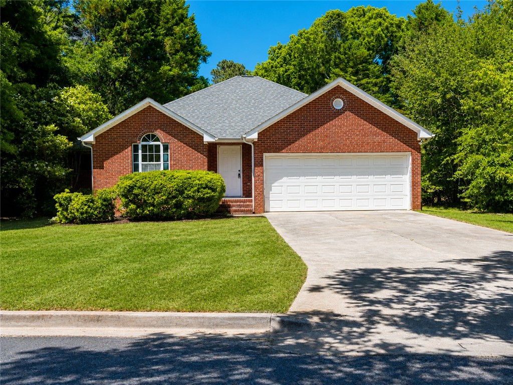 101 Woodbridge Circle Anderson, SC 29621 - Photo 1 of 21 This classic brick residence offers comfort and timeless appeal, nestled within a lush green setting.