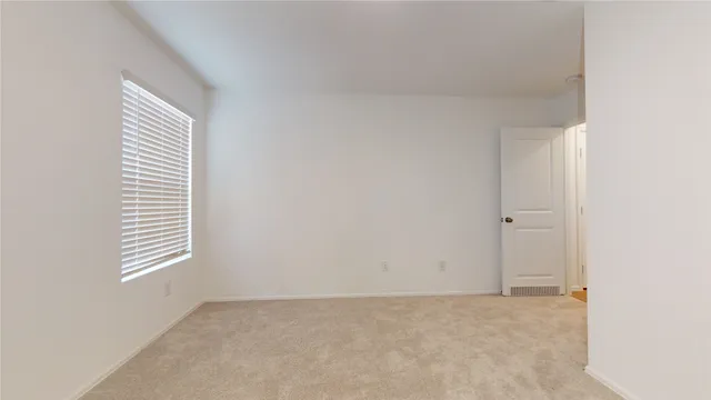 a view of an empty room with window