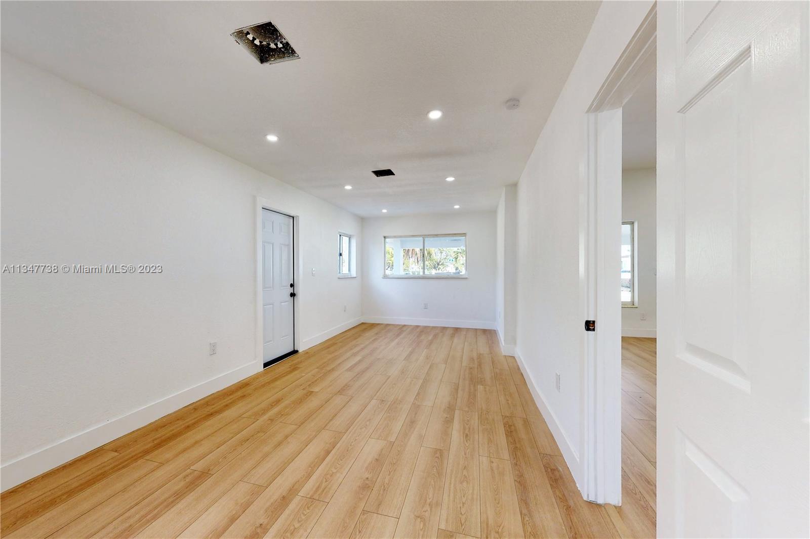 7950 Southwest 22nd Street Miami, FL 33155 - Photo 12 of 36 a view of empty room with wooden floor
