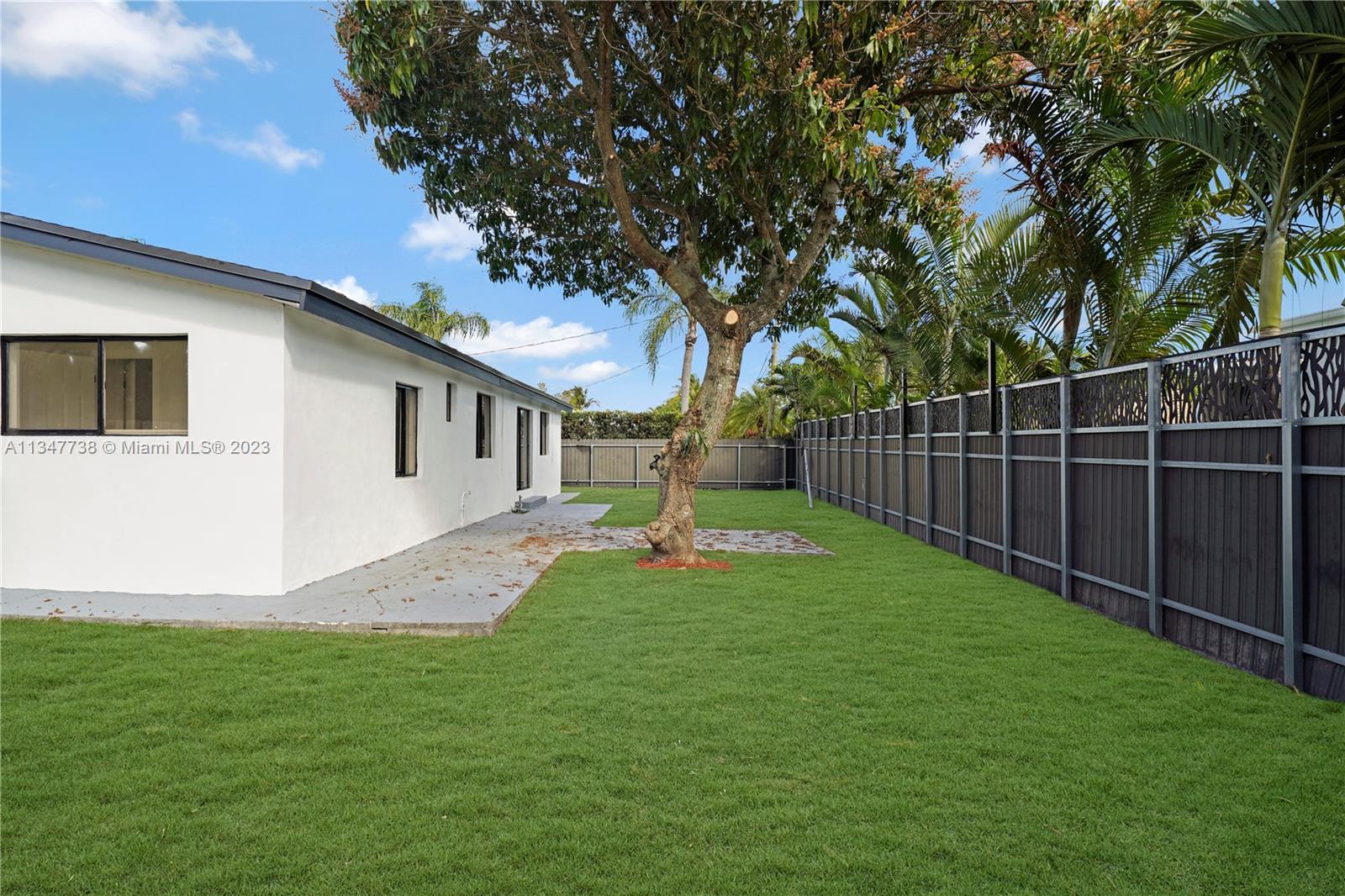 7950 Southwest 22nd Street Miami, FL 33155 - Photo 32 of 36 a garden view