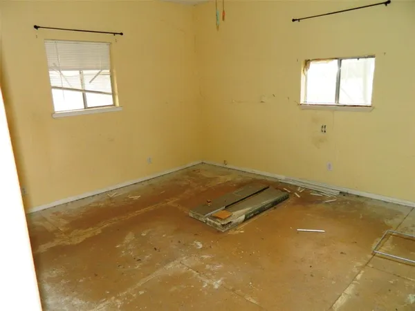 a bathroom with a sink toilet and mirror