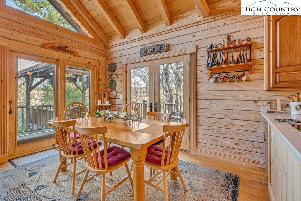 801 Wagon Ridge Road Ferguson, NC 28624 - Photo 19 of 44 a view of a dining room with furniture window and outside view