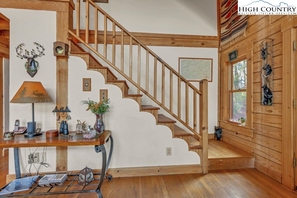 801 Wagon Ridge Road Ferguson, NC 28624 - Photo 26 of 44 a view of entryway livingroom and hall with wooden floor