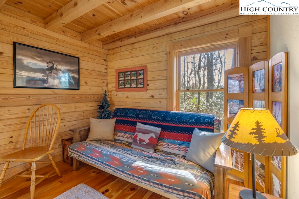 801 Wagon Ridge Road Ferguson, NC 28624 - Photo 31 of 44 a bench sitting in front of a building