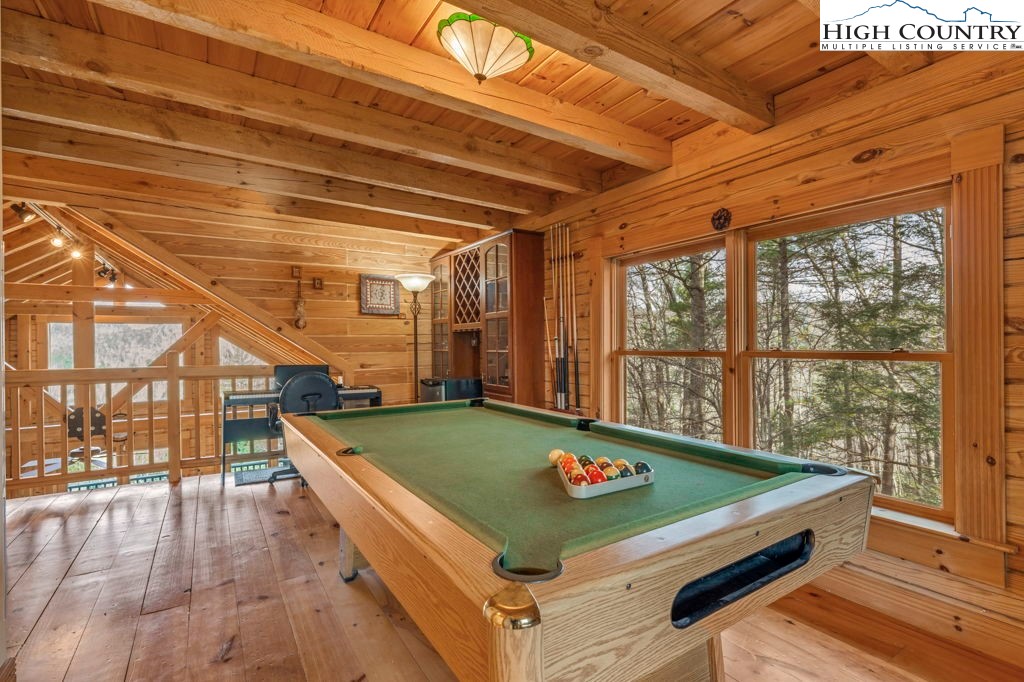 801 Wagon Ridge Road Ferguson, NC 28624 - Photo 32 of 44 a room with pool table and large windows