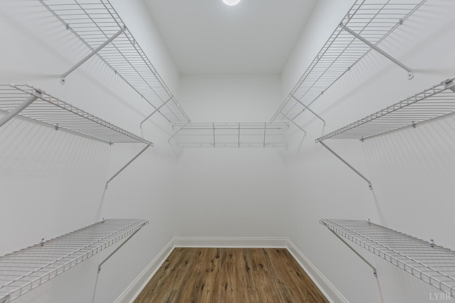 109 Tosh Lane Goodview, VA 24095 - Photo 17 of 32 a view of a room with racks on the wall