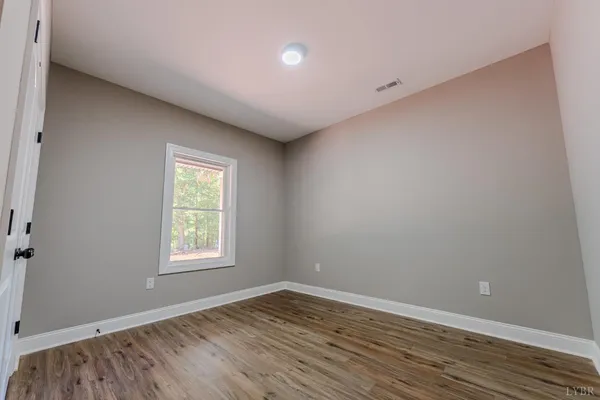 a bathroom with a bathtub a toilet and a shower