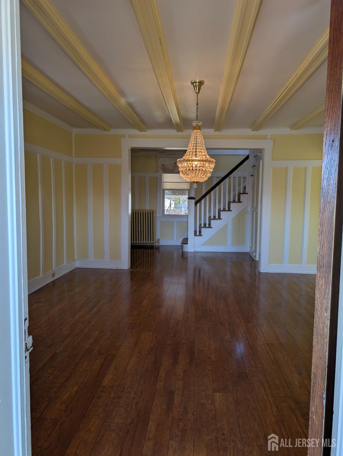 4 New Amwell Road Hillsborough, NJ 08844 - Photo 8 of 12 a view of entryway and hall with wooden floor