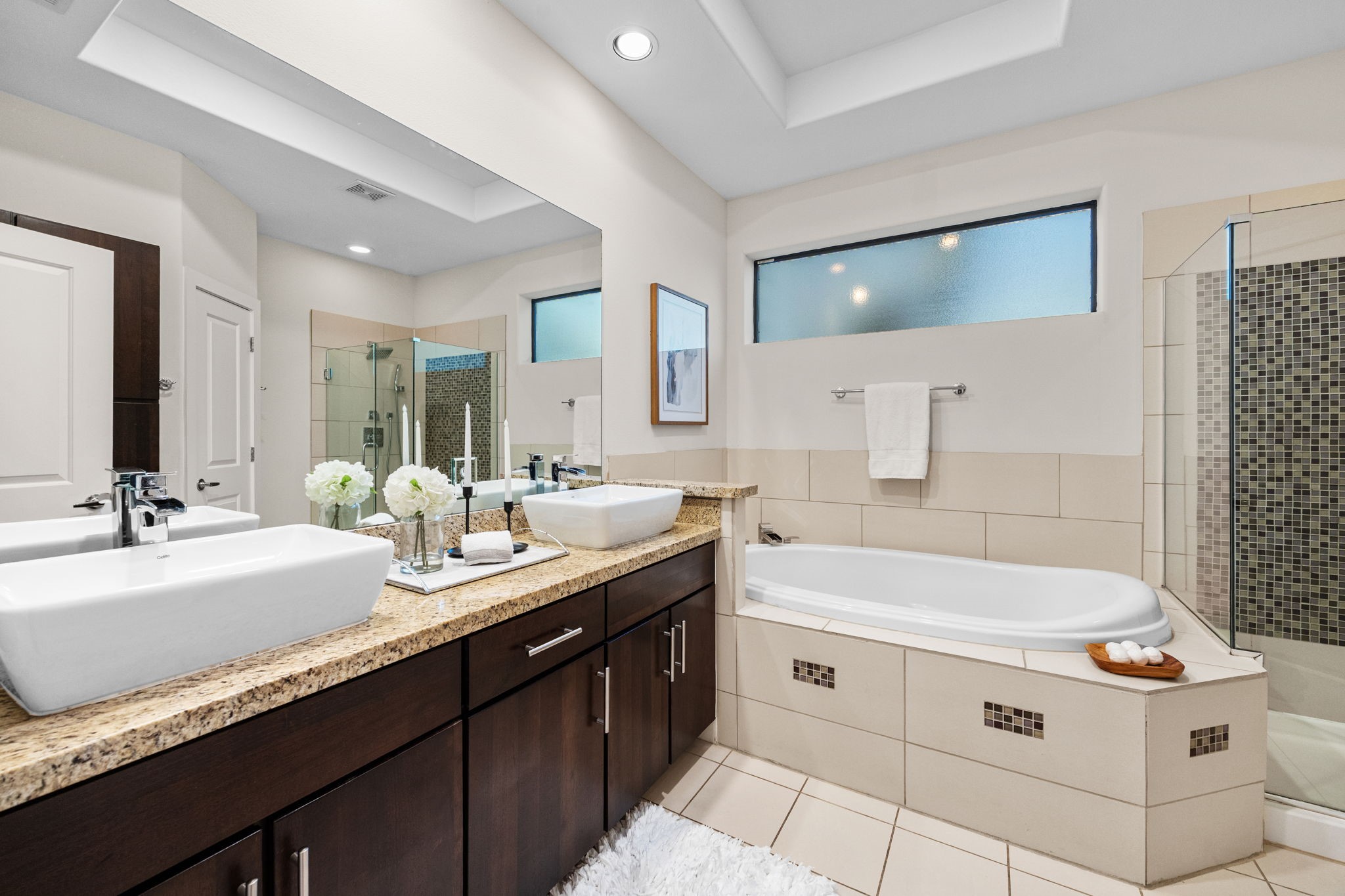 2005 Hickory Street Houston, TX 77007 - Photo 11 of 29 a bathroom with a double vanity sink mirror and bathtub