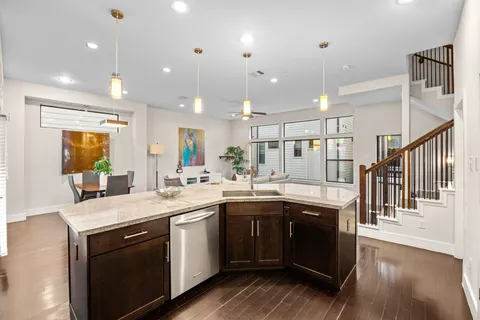 a kitchen with lots of counter space sink and appliances