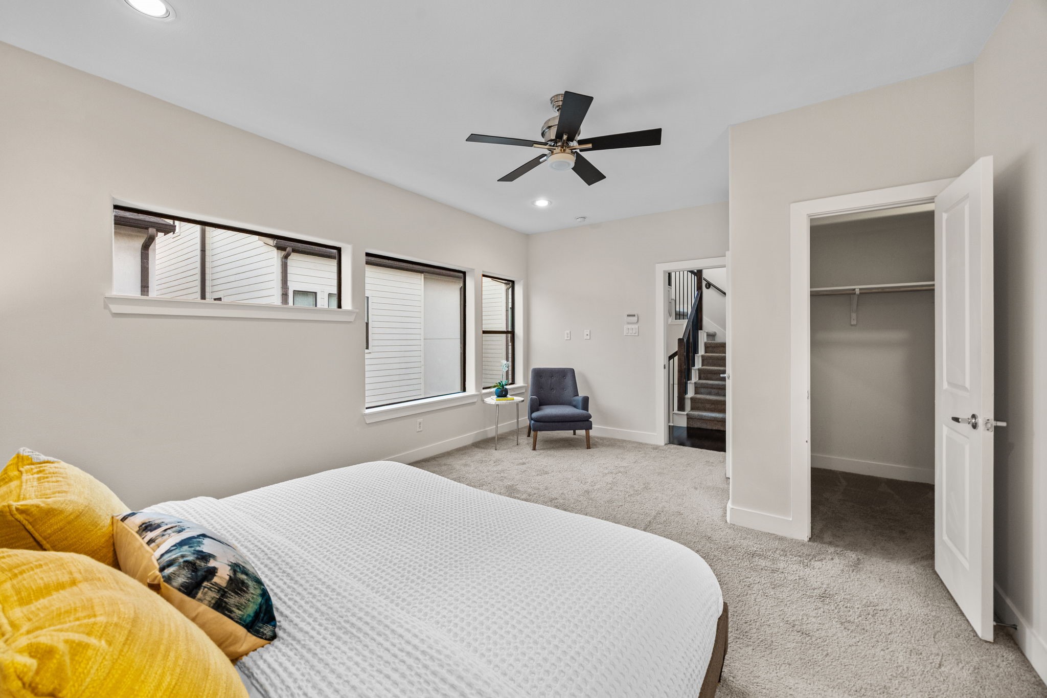 2005 Hickory Street Houston, TX 77007 - Photo 20 of 29 a bedroom with a bed and a chair