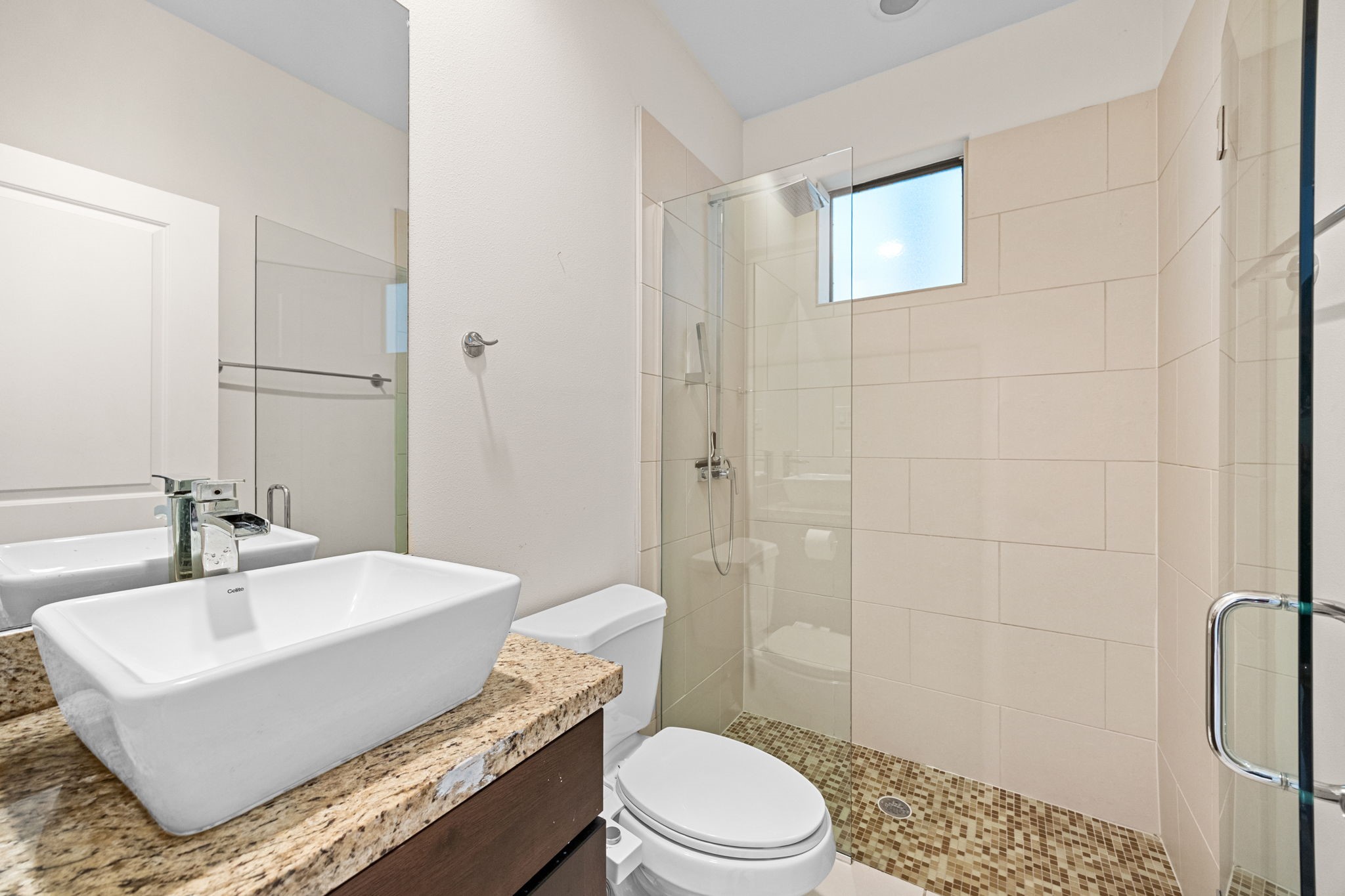 2005 Hickory Street Houston, TX 77007 - Photo 26 of 29 a bathroom with a sink toilet and shower