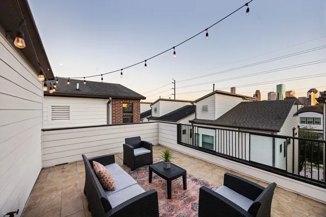 a terrace of a house with wooden floor