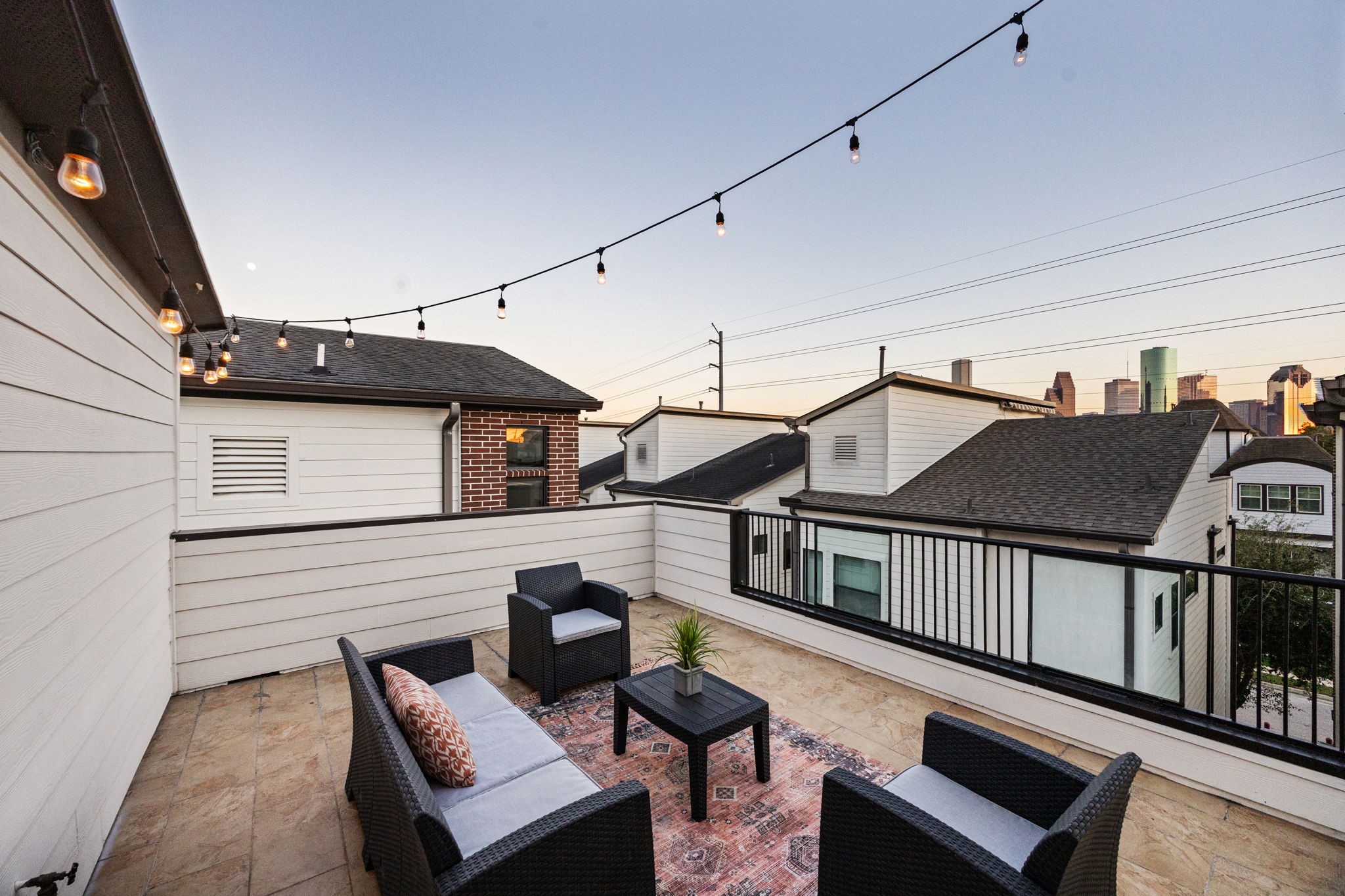 2005 Hickory Street Houston, TX 77007 - Photo 4 of 27 a terrace of a house with wooden floor