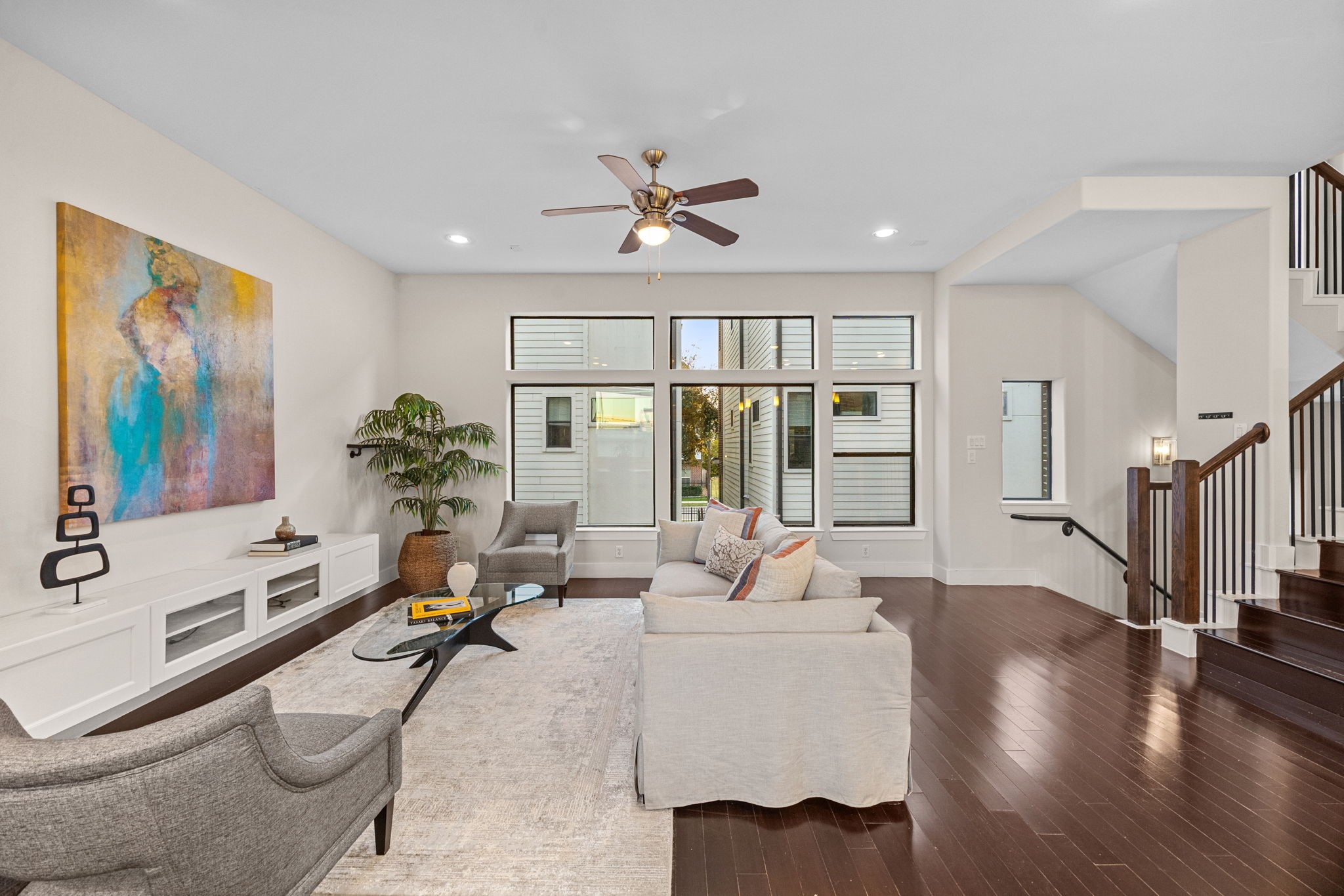 2005 Hickory Street Houston, TX 77007 - Photo 5 of 29 a living room with furniture ceiling fan and a wooden floor