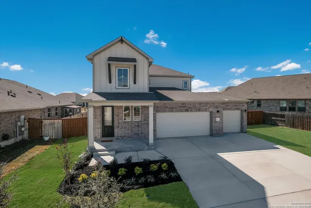 a house view with a garden space