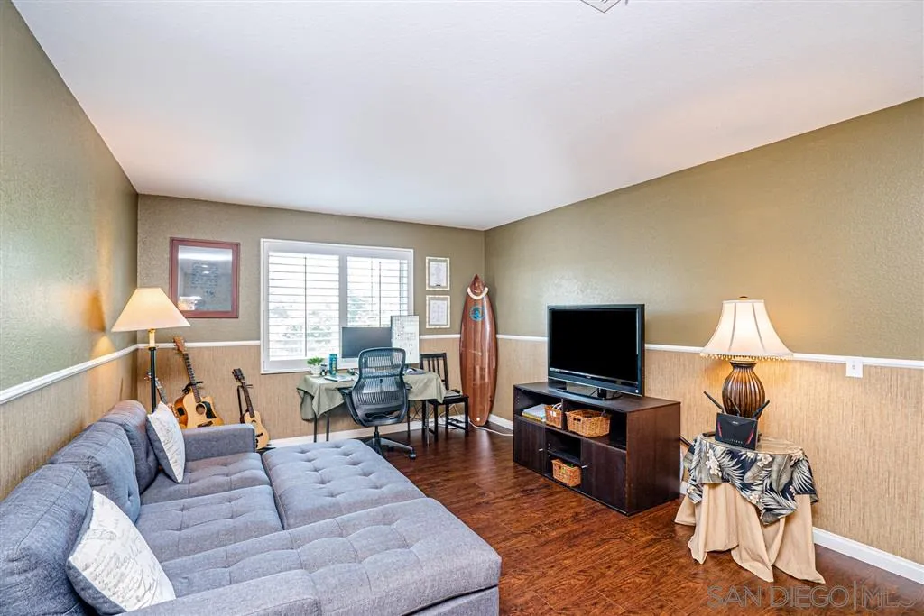 300 River Ranch Way Oceanside, CA 92057 - Photo 19 of 25 a living room with furniture and a flat screen tv