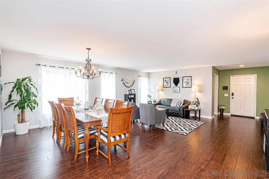 300 River Ranch Way Oceanside, CA 92057 - Photo 4 of 25 a view of a livingroom with furniture and wooden floor