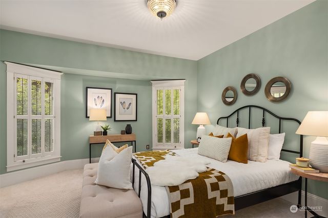 a bedroom with bed and a window