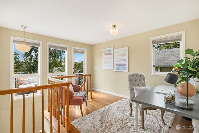 a view of a dining room with furniture window and outside view