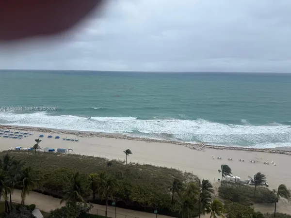 a view of beach and ocean