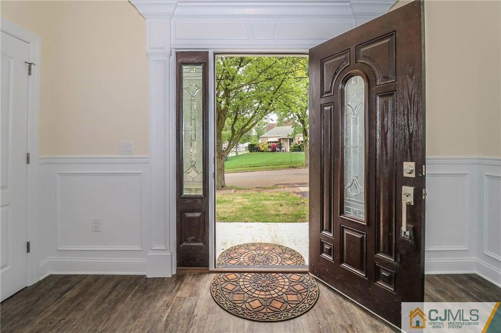 64 Winthrop Road Edison, NJ 08817 - Photo 6 of 24 a view of entryway with wooden floor