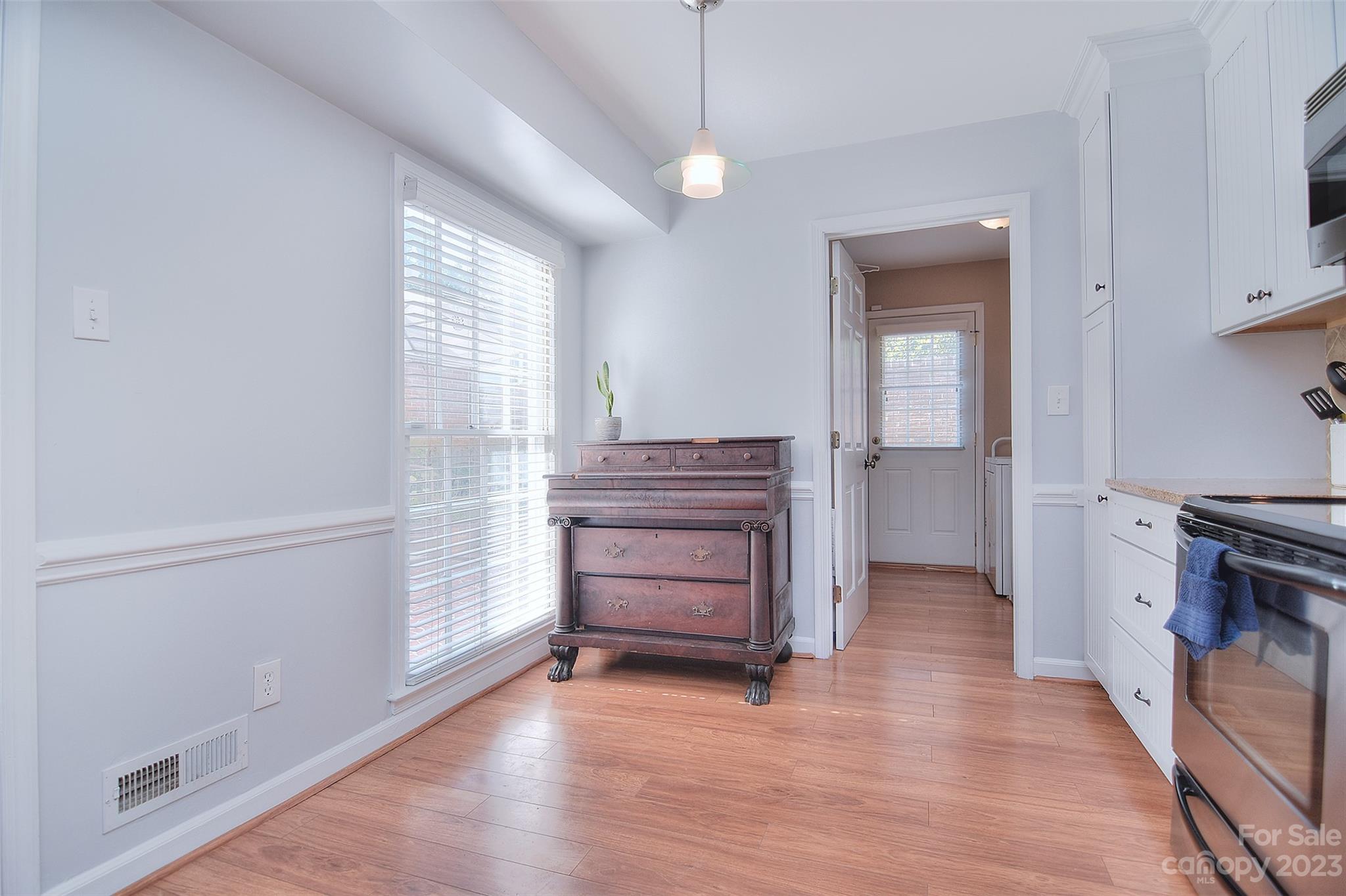 4415 Simsbury Road Charlotte, NC 28226 - Photo 14 of 36 a view of room with wooden floor