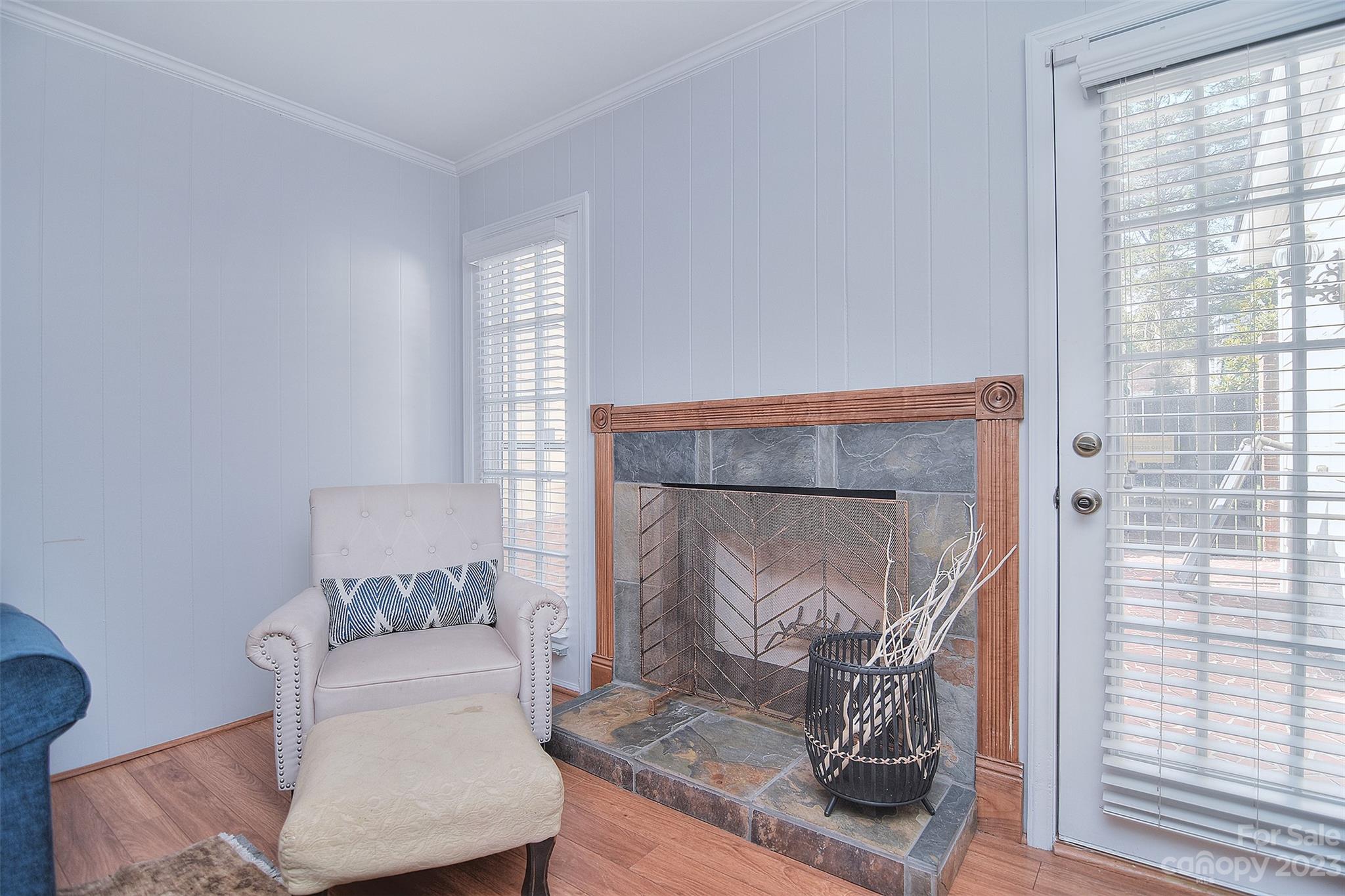 4415 Simsbury Road Charlotte, NC 28226 - Photo 18 of 36 a living room with furniture and a fireplace