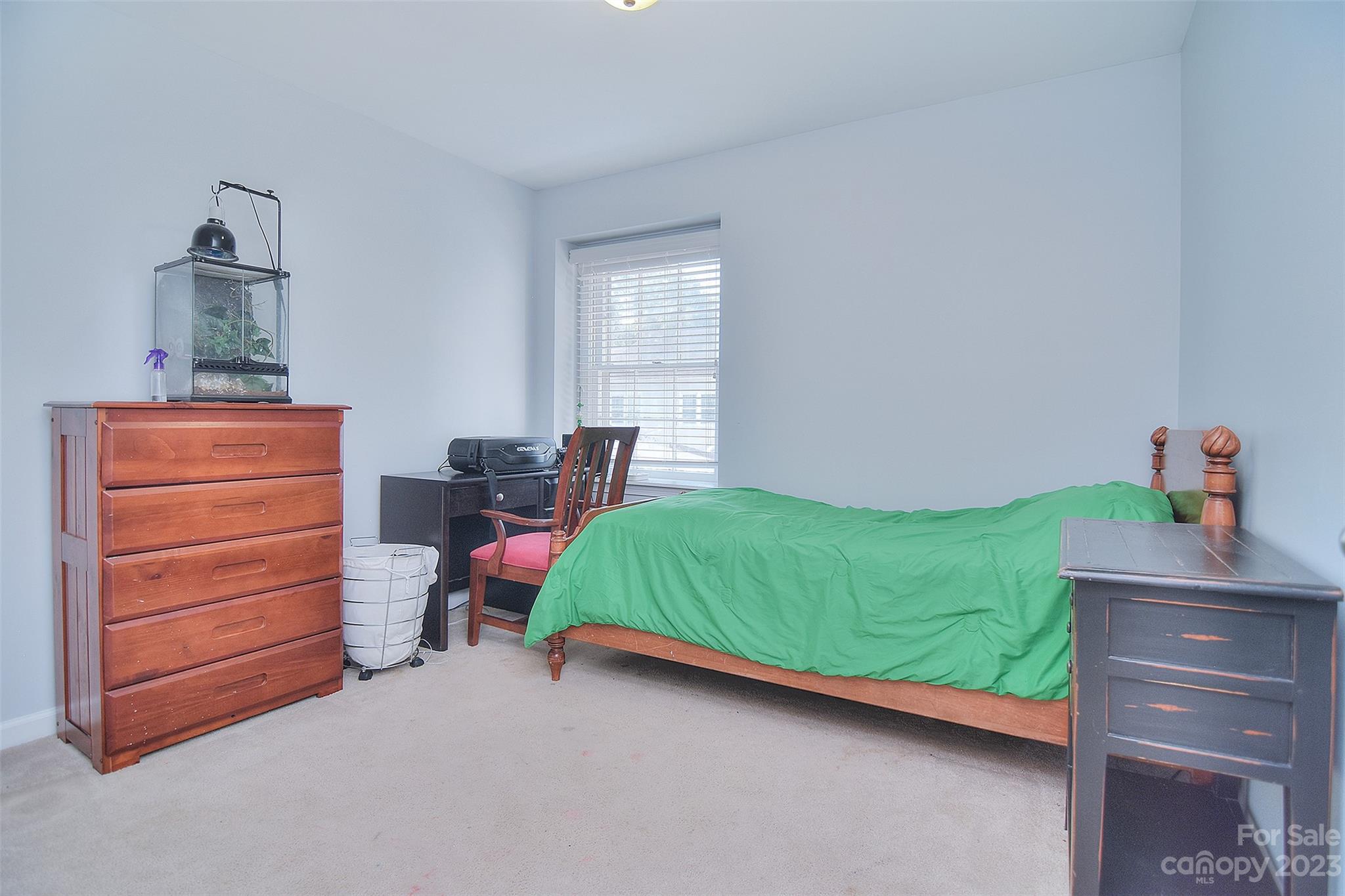 4415 Simsbury Road Charlotte, NC 28226 - Photo 30 of 36 a bedroom with a bed and a dresser